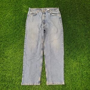 Vintage LEVIS 550 Baggy Straight Jeans 36x32 Faded Medium-Wash